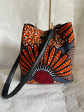 Sac-wax-femme-sac-à-main-africain-simili-cuir-senegal-prix-pas-cher-tissu-pagne-rouge-marron-bleu-sac-bourse-seau-bucket-bandouliere 