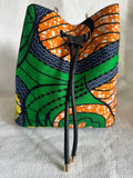 Sac-wax-femme-sac-à-main-africain-simili-cuir-senegal-prix-pas-cher-tissu-pagne-vert-orange-jaune-sac-bourse-seau-bucket-laniere 