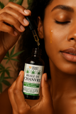 huile-chanvre-bienfaits-cbd-feuilles-cannabis-visage-cheveux-massage-utilisation-cheveux-blanc--pure-chanvre-bio-naturelle-meilleure-kemet-market-pharmacie-avis-test-main-bouteille-verre-ambre-femme-antillaise
