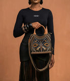 Maroquinerie luxe africain Sac bandoulière femmes afro style wakanda ethnique chic couleur Bogolan marron noir doré brun styliste africain noir maison immortel Paris wax 
